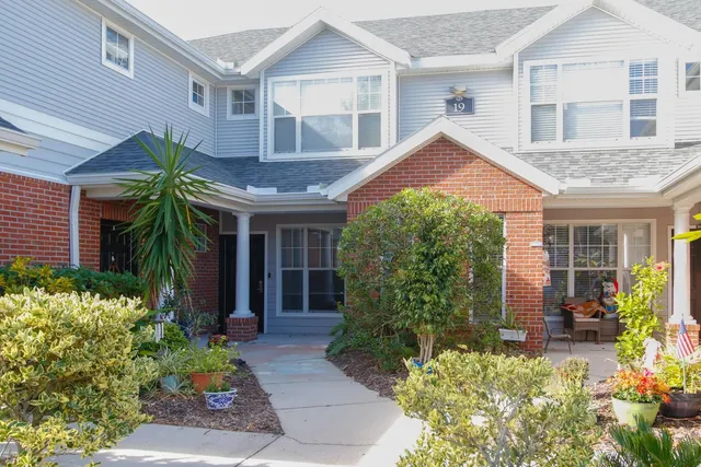 front view of a house and a yard