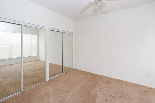a bathroom with a toilet a sink and shower