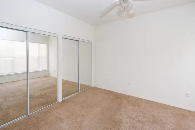 a bathroom with a toilet a sink and shower