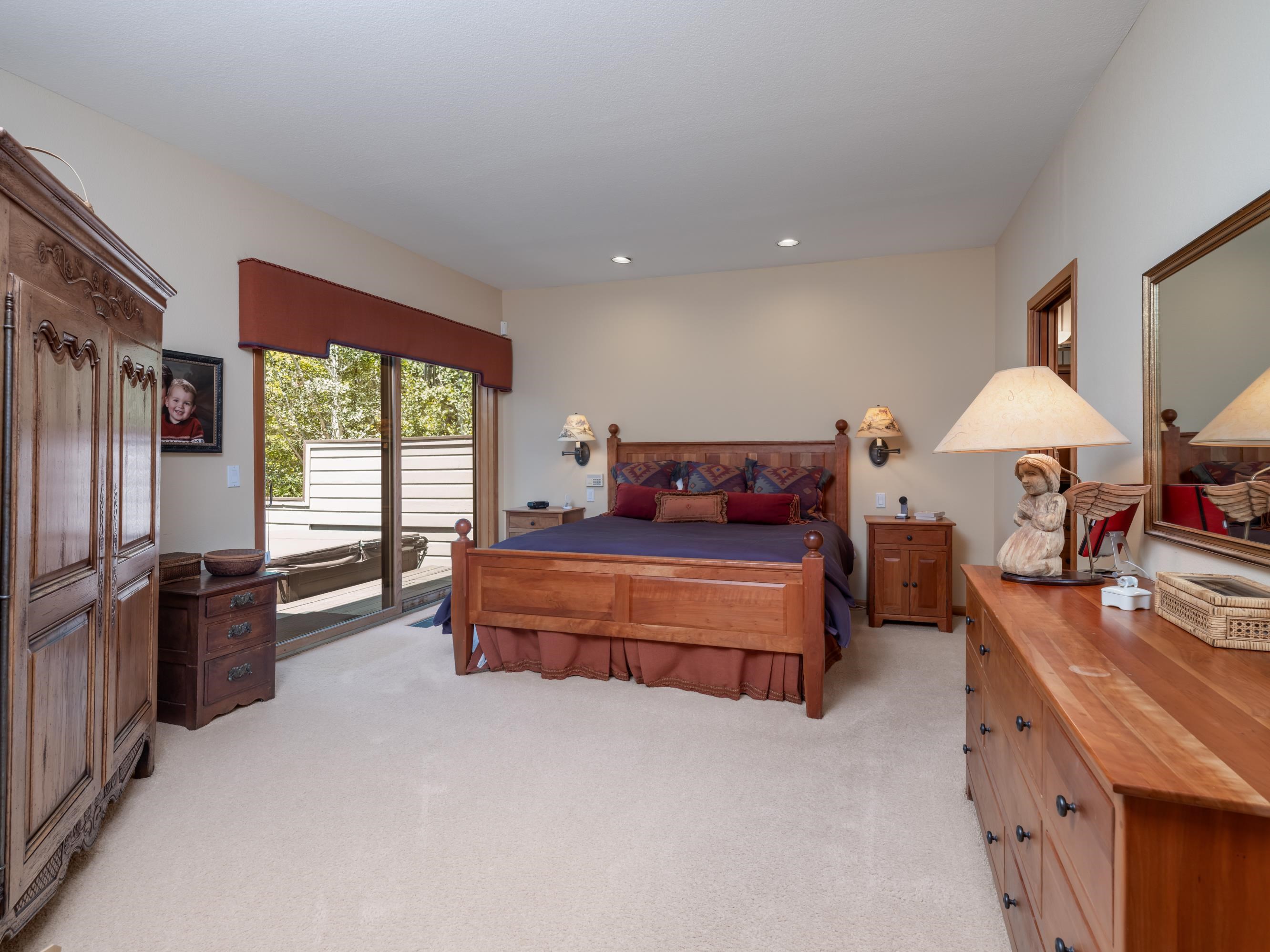 134 Quail View Circle Clio, CA 96106 - Photo 17 of 49 a bedroom with furniture and a window
