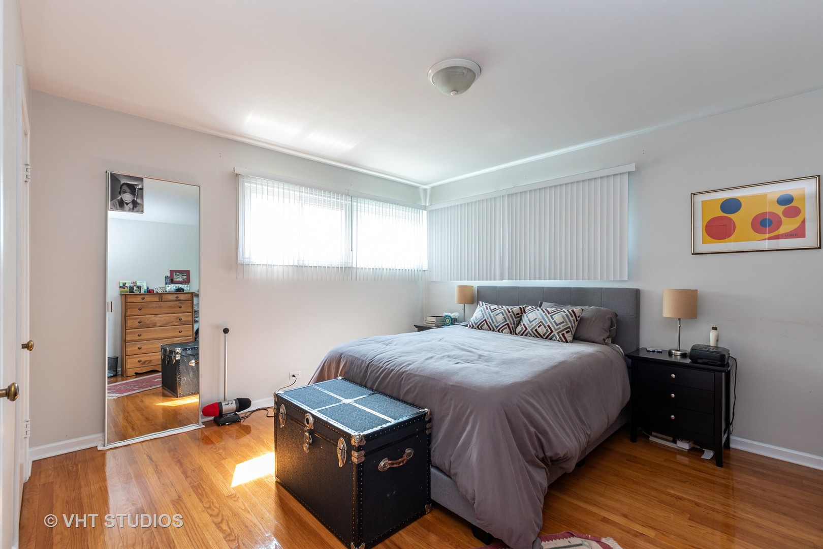 1307 Ridge Road Highland Park, IL 60035 - Photo 5 of 10 a bedroom with a bed and a book shelf