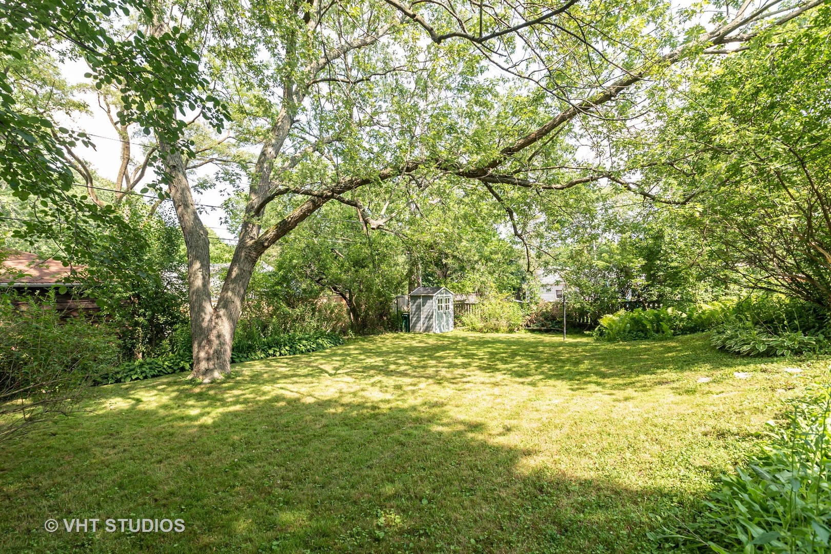 1307 Ridge Road Highland Park, IL 60035 - Photo 10 of 10 a view of a yard with a tree