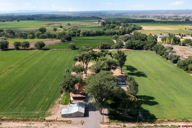 a view of a city with a lake