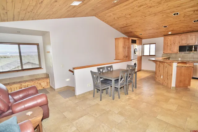 a view of a dining room with furniture