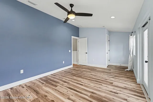 a view of a livingroom with a ceiling fan