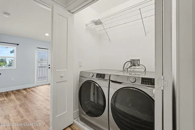 a utility room with dryer and washer