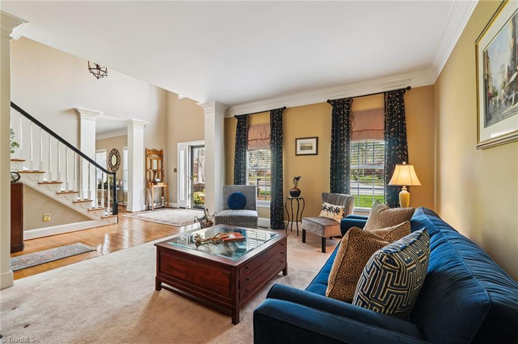 3833 Wesseck Drive High Point, NC 27265 - Photo 12 of 50 Living room shows how open this space is yet still separate for a possible work from home space!