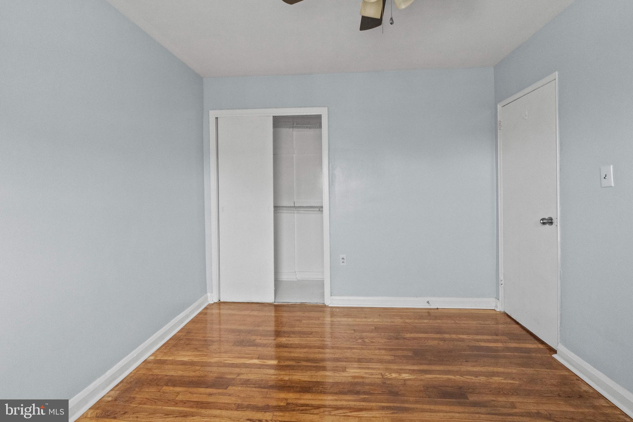 574 Brisbane Road Baltimore, MD 21229 - Photo 18 of 38 a view of room with wooden floor