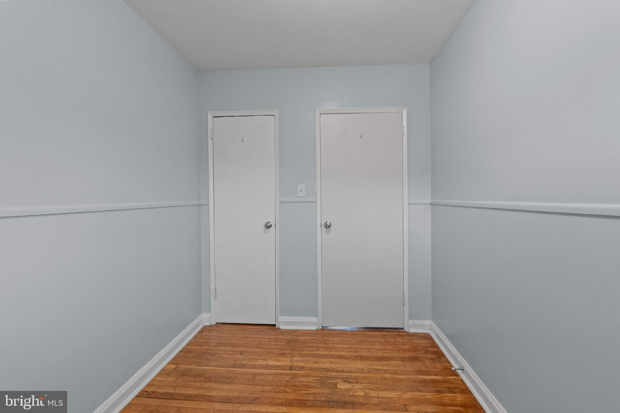 574 Brisbane Road Baltimore, MD 21229 - Photo 23 of 38 a view of a room with wooden floor and bathroom