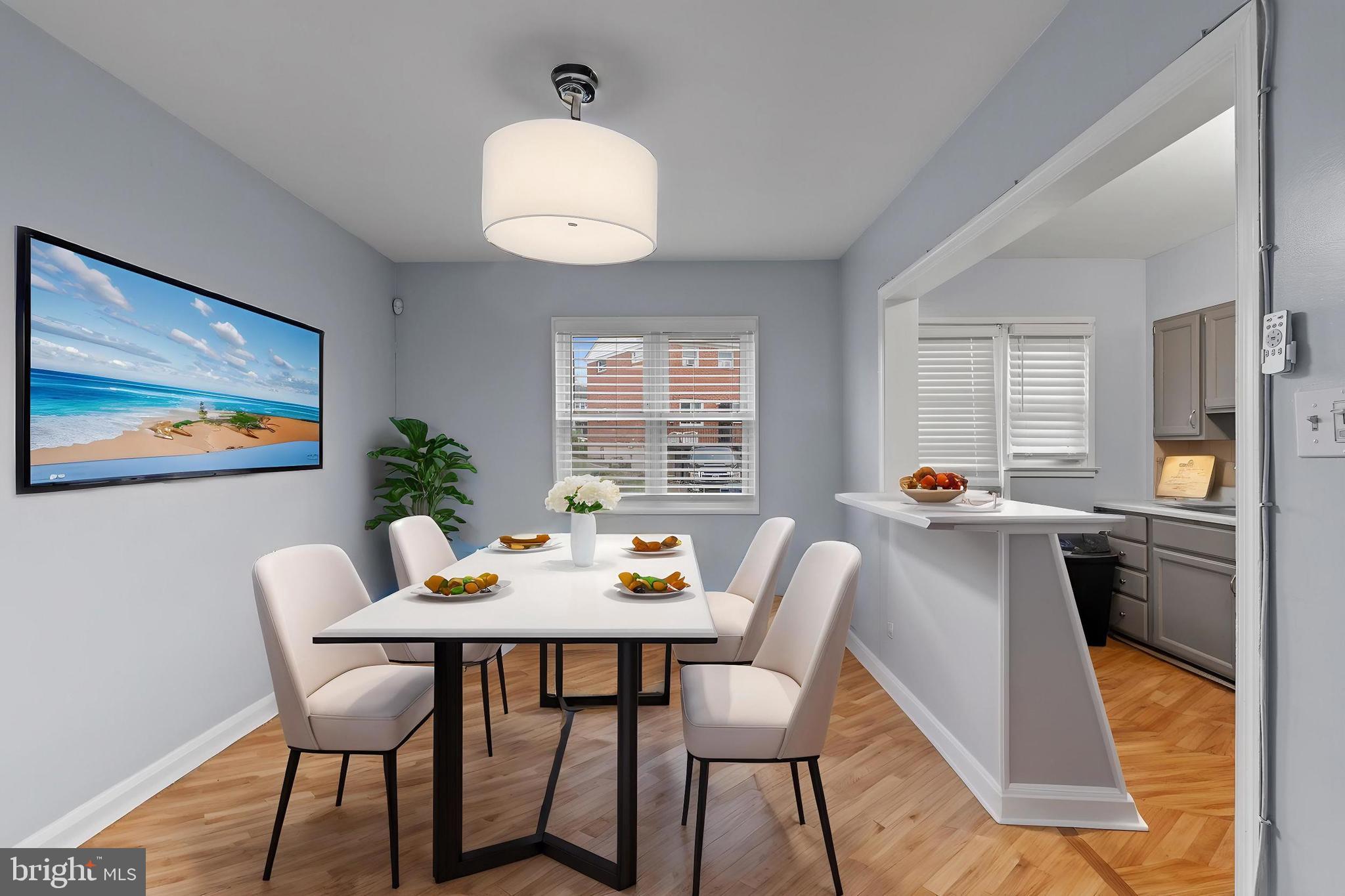 574 Brisbane Road Baltimore, MD 21229 - Photo 9 of 38 a dining room with furniture and window