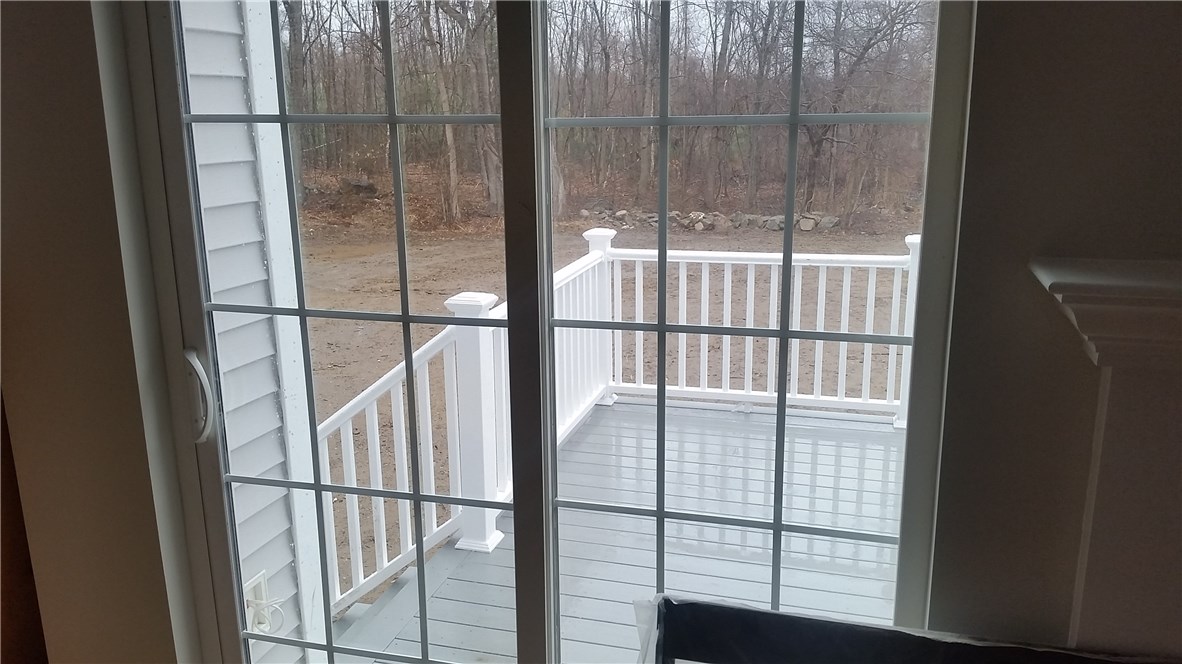 3057 Diamond Hill Road Cumberland, RI 02864 - Photo 7 of 16 Family Rm looking to deck and backyard