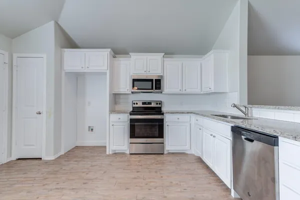 a view of a room with racks on the wall