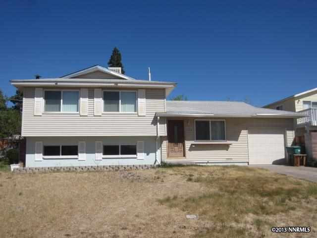 3459 Rauscher Drive Reno, NV 89503 - Photo 1 of 1 a front view of a house with a yard