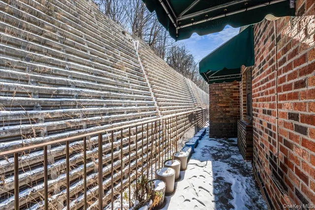 a view of a backyard with a white house