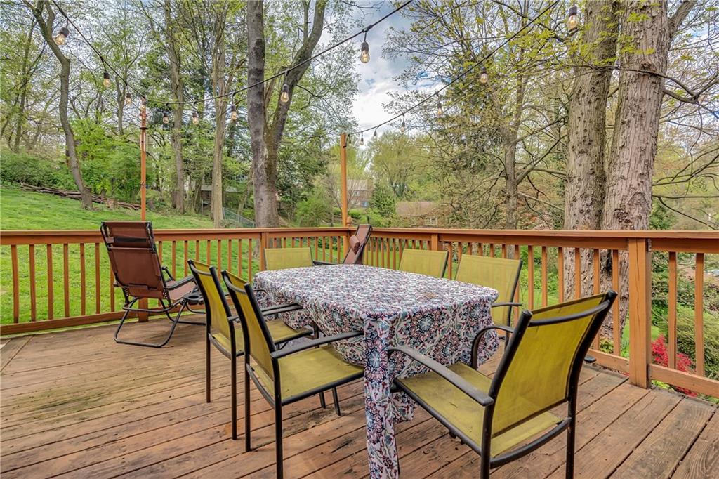 14 Forest Hills Road Pittsburgh, PA 15221 - Photo 22 of 25 Deck off of the kitchen with view of the back yard.