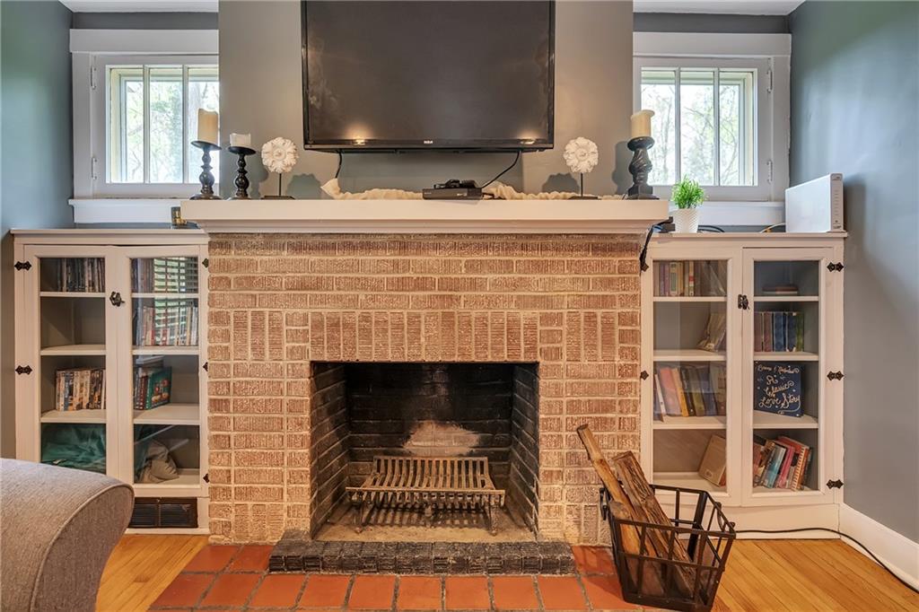 14 Forest Hills Road Pittsburgh, PA 15221 - Photo 8 of 25 Original book shelves in living room and fire place.
