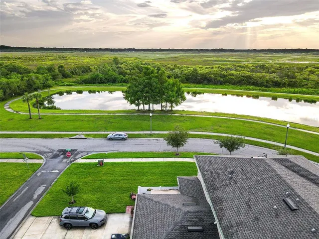 an aerial view of a house with a garden