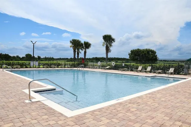 a view of a garden from a lake