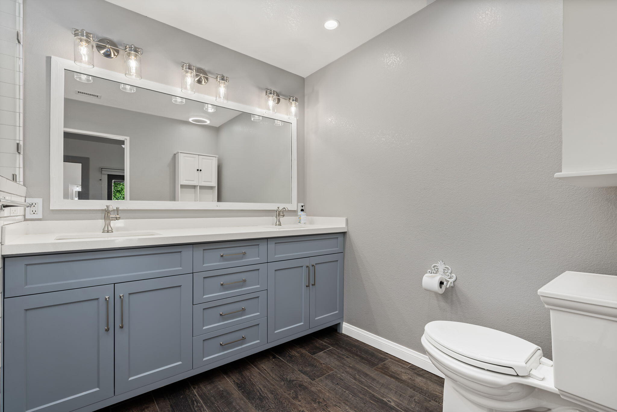 79540 Bermuda Dunes Drive Bermuda Dunes, CA 92203 - Photo 20 of 27 a bathroom with a granite countertop toilet sink and mirror
