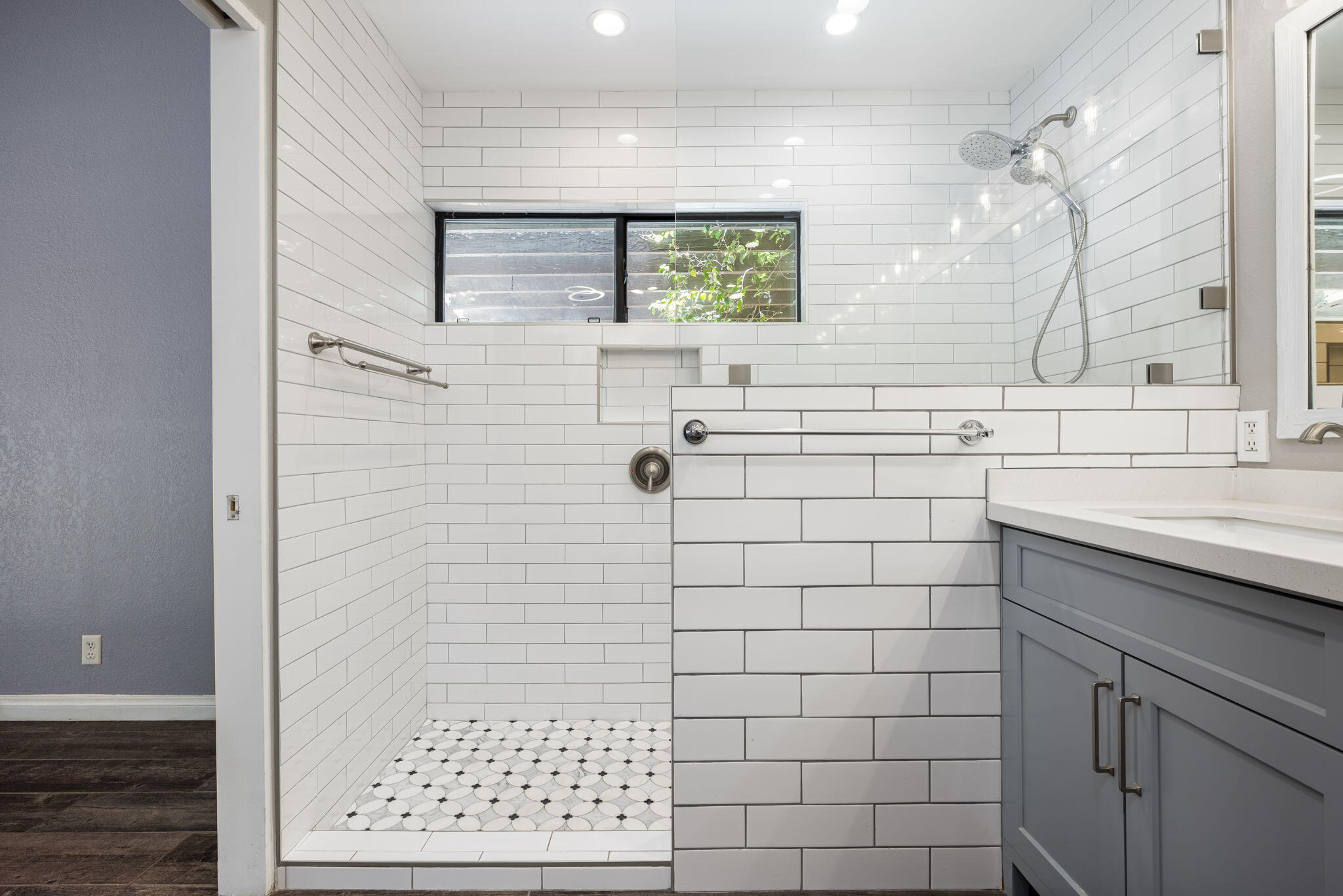79540 Bermuda Dunes Drive Bermuda Dunes, CA 92203 - Photo 21 of 27 a bathroom with a sink a toilet a window a vanity and shower