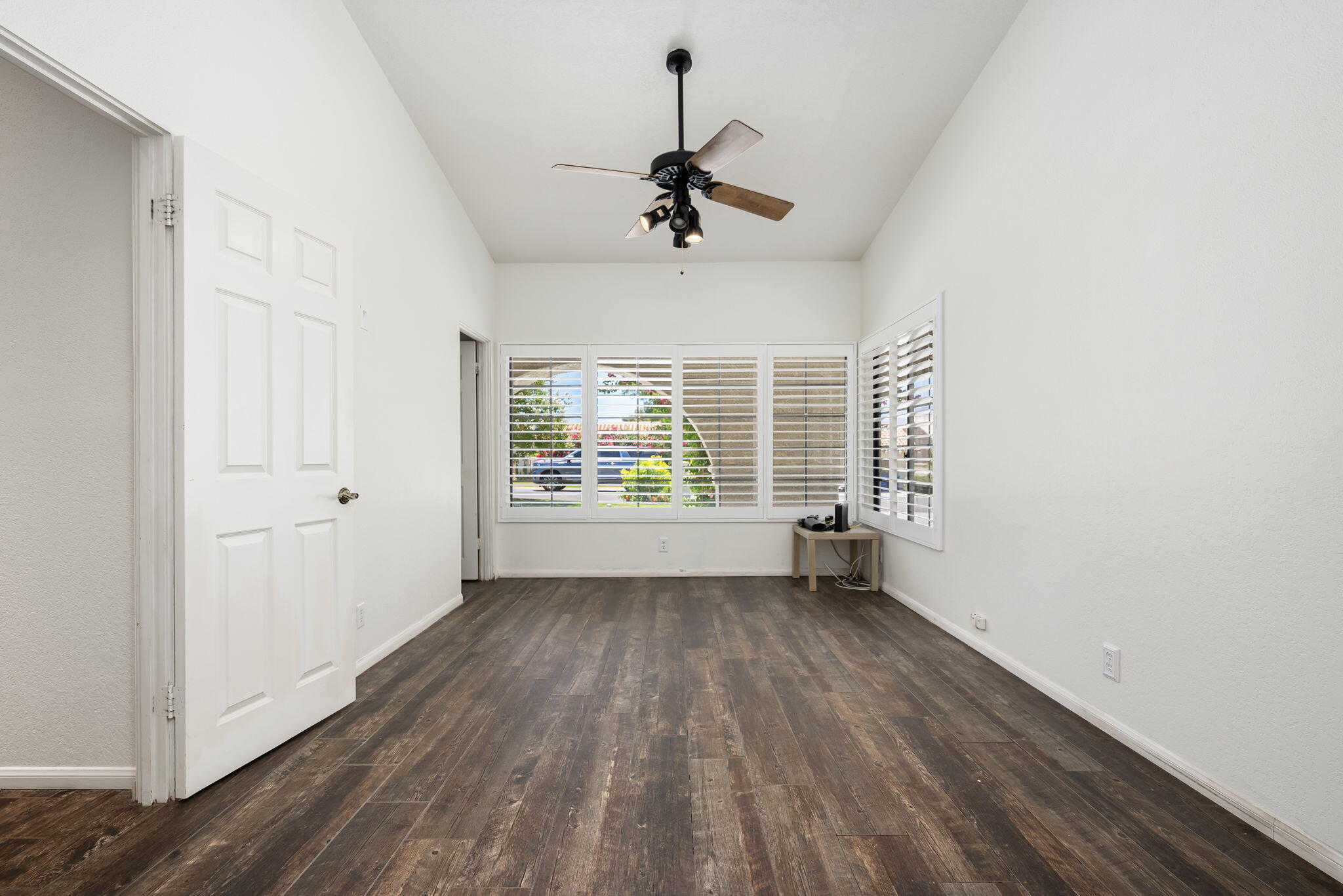 79540 Bermuda Dunes Drive Bermuda Dunes, CA 92203 - Photo 25 of 27 a view of a room with wooden floor fan and windows