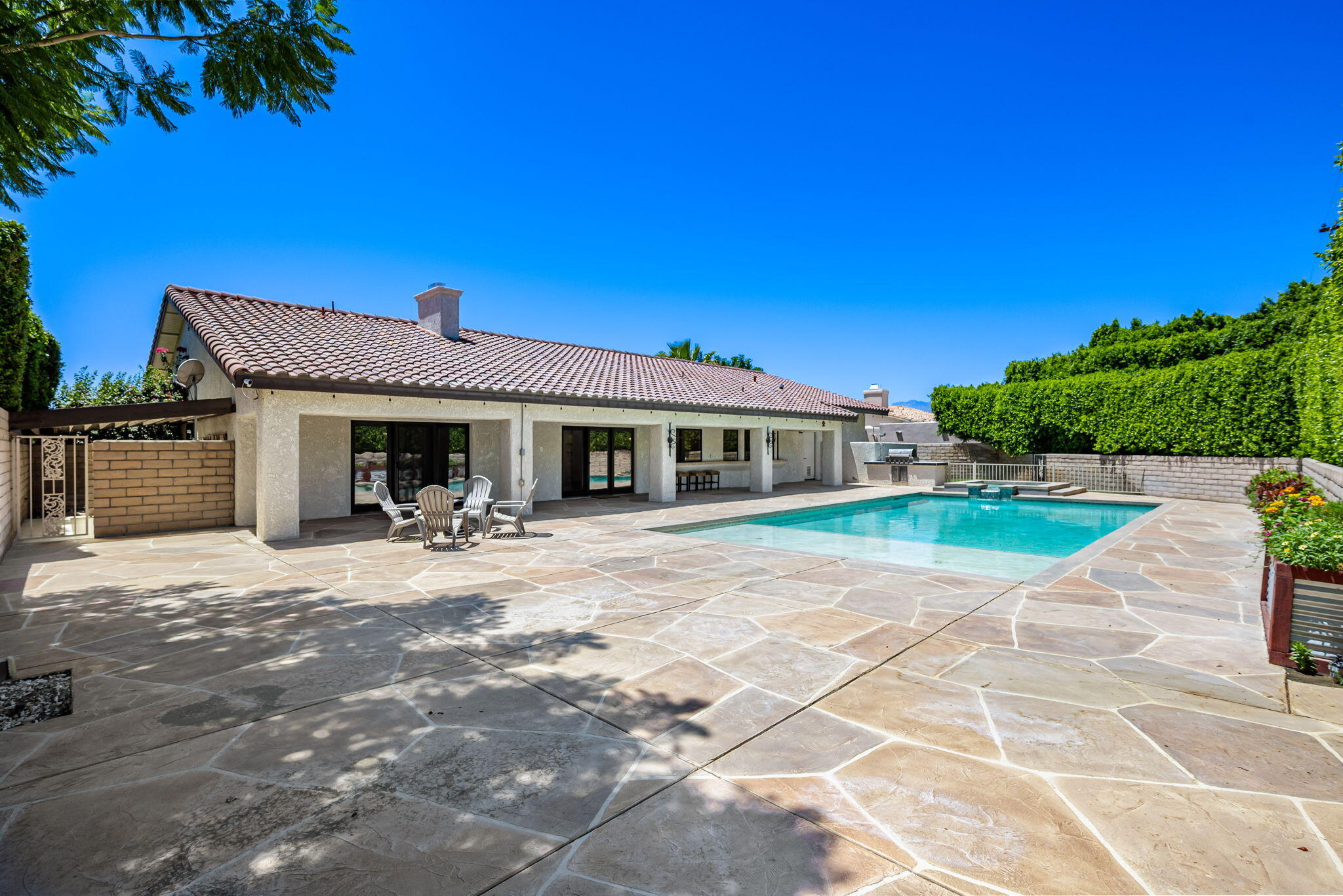 79540 Bermuda Dunes Drive Bermuda Dunes, CA 92203 - Photo 5 of 27 a front view of a house with a yard