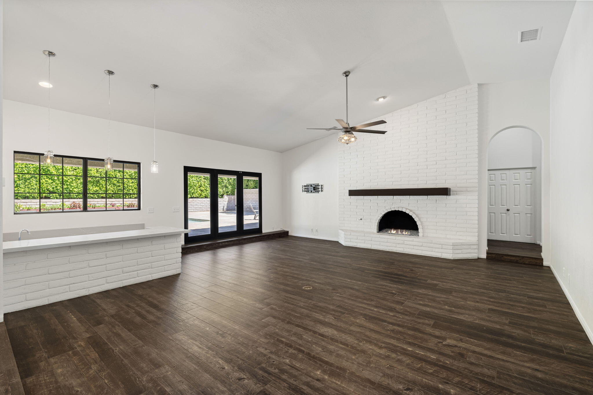 79540 Bermuda Dunes Drive Bermuda Dunes, CA 92203 - Photo 9 of 27 an empty room with wooden floor and window