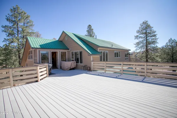 a front view of a house with a outdoor space