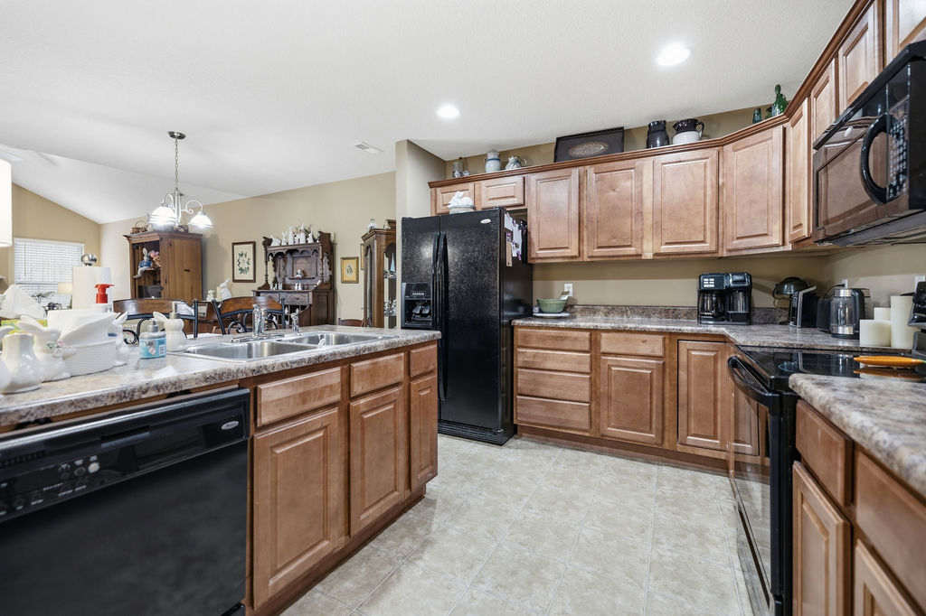 109 Abigail Lane Anderson, SC 29621 - Photo 11 of 29 This spacious kitchen offers a seamless flow into the dining area, perfect for daily living and entertaining.
