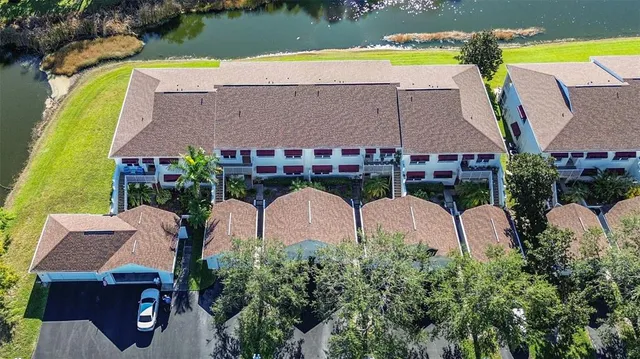 aerial view of house with a yard