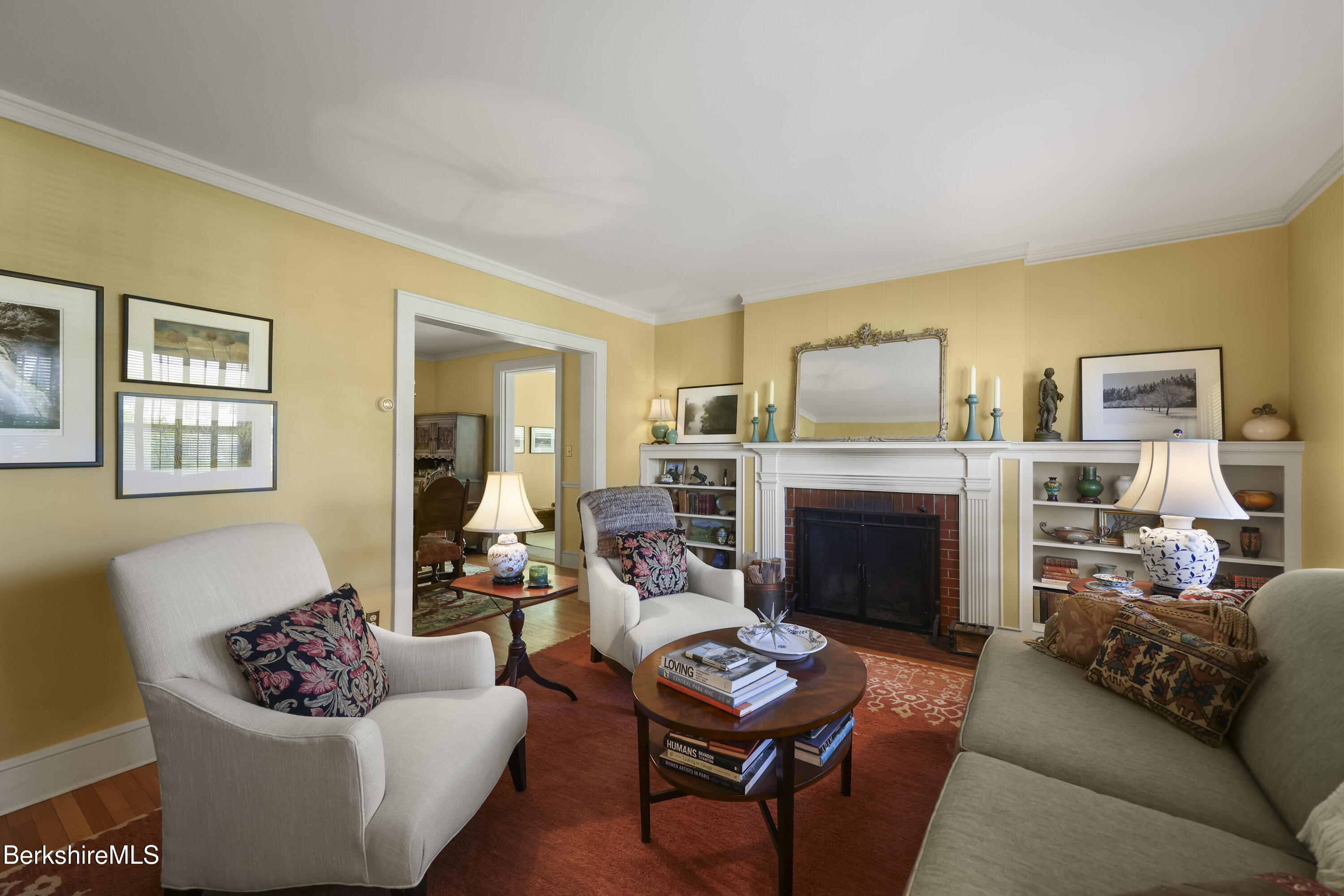 39 Lexington Parkway Pittsfield, MA 01201 - Photo 12 of 48 a living room with furniture and a fireplace
