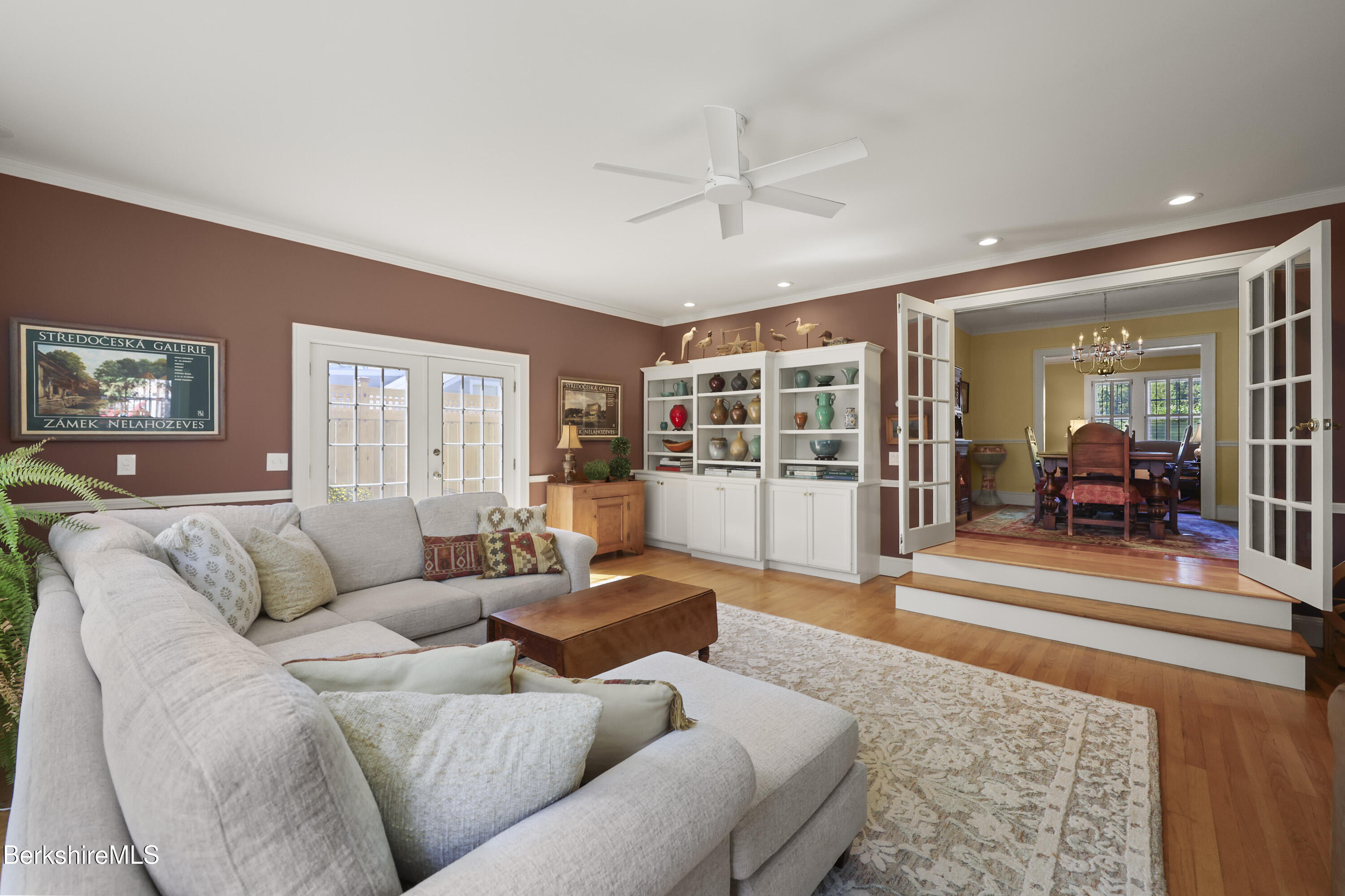 39 Lexington Parkway Pittsfield, MA 01201 - Photo 19 of 48 a living room with furniture and a wooden floor