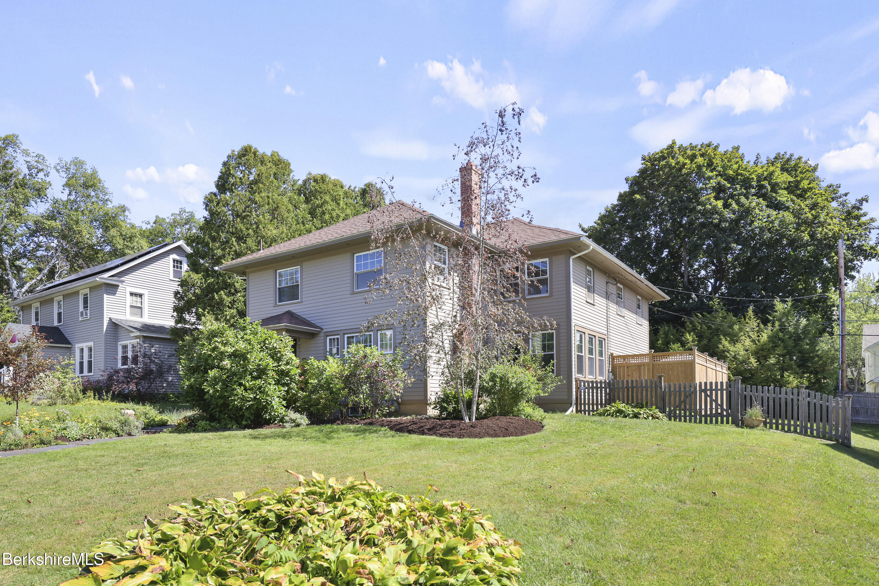 39 Lexington Parkway Pittsfield, MA 01201 - Photo 2 of 48 a front view of a house with garden