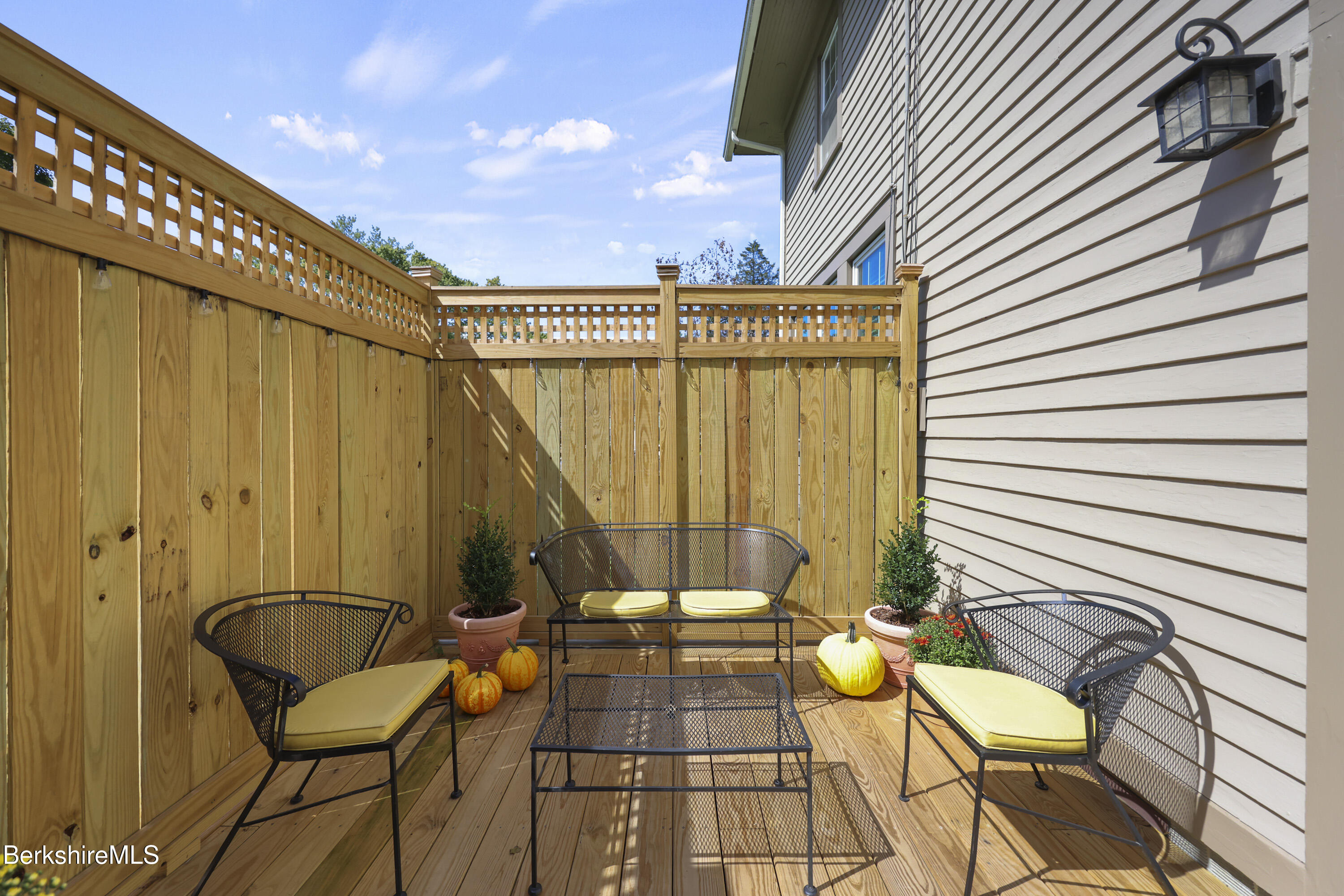 39 Lexington Parkway Pittsfield, MA 01201 - Photo 21 of 48 a view of a chairs and table in the balcony