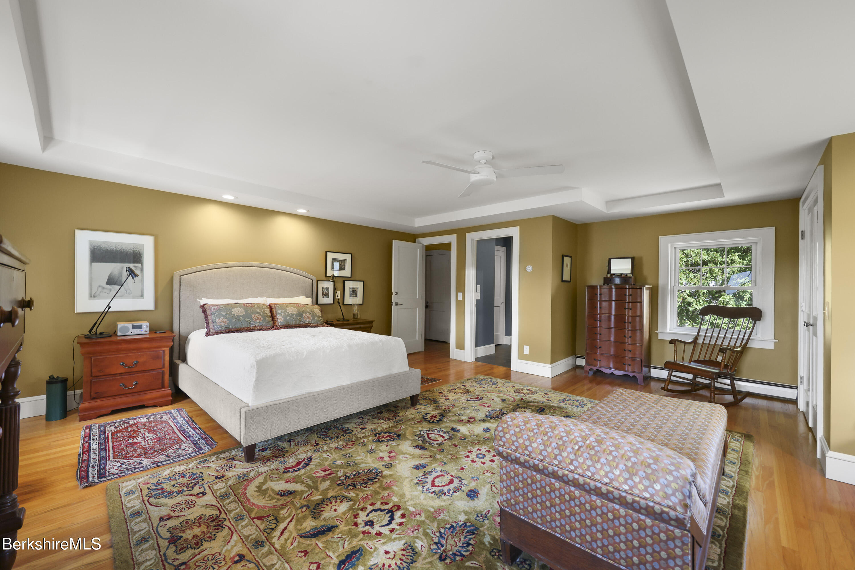 39 Lexington Parkway Pittsfield, MA 01201 - Photo 31 of 48 a bedroom with a large bed and a large window