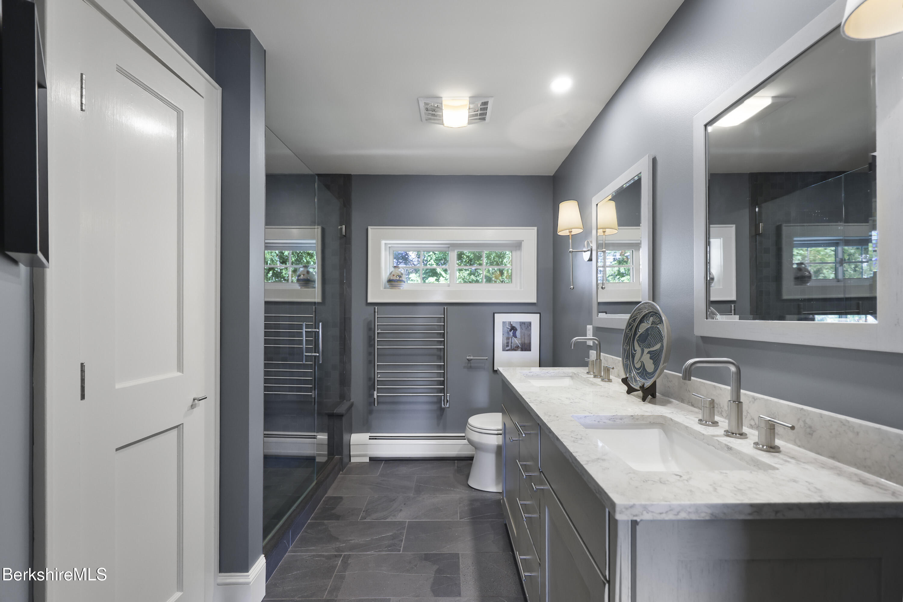 39 Lexington Parkway Pittsfield, MA 01201 - Photo 33 of 48 a bathroom with a double vanity sink toilet and shower