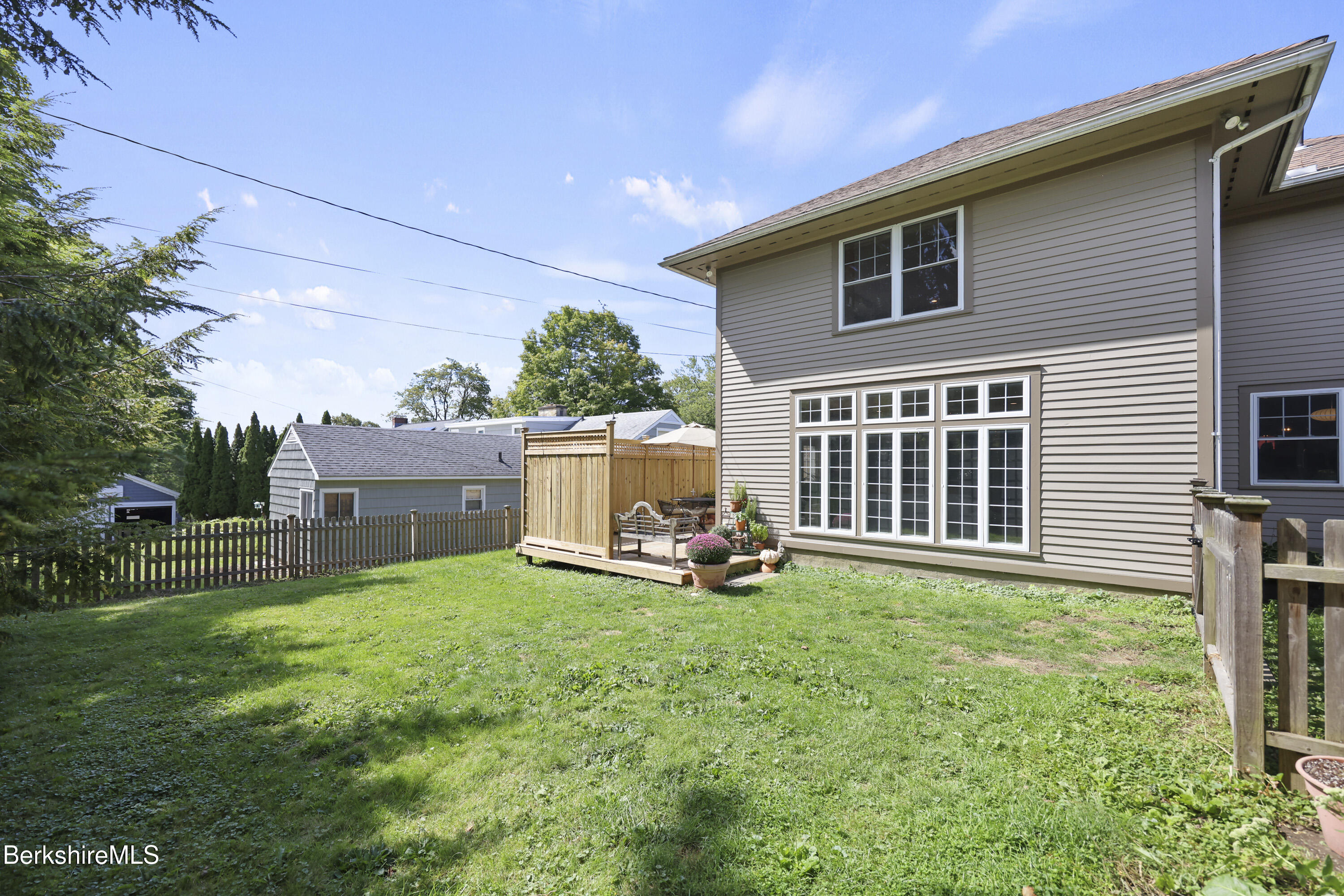 39 Lexington Parkway Pittsfield, MA 01201 - Photo 38 of 48 a view of a house with backyard and a small yard