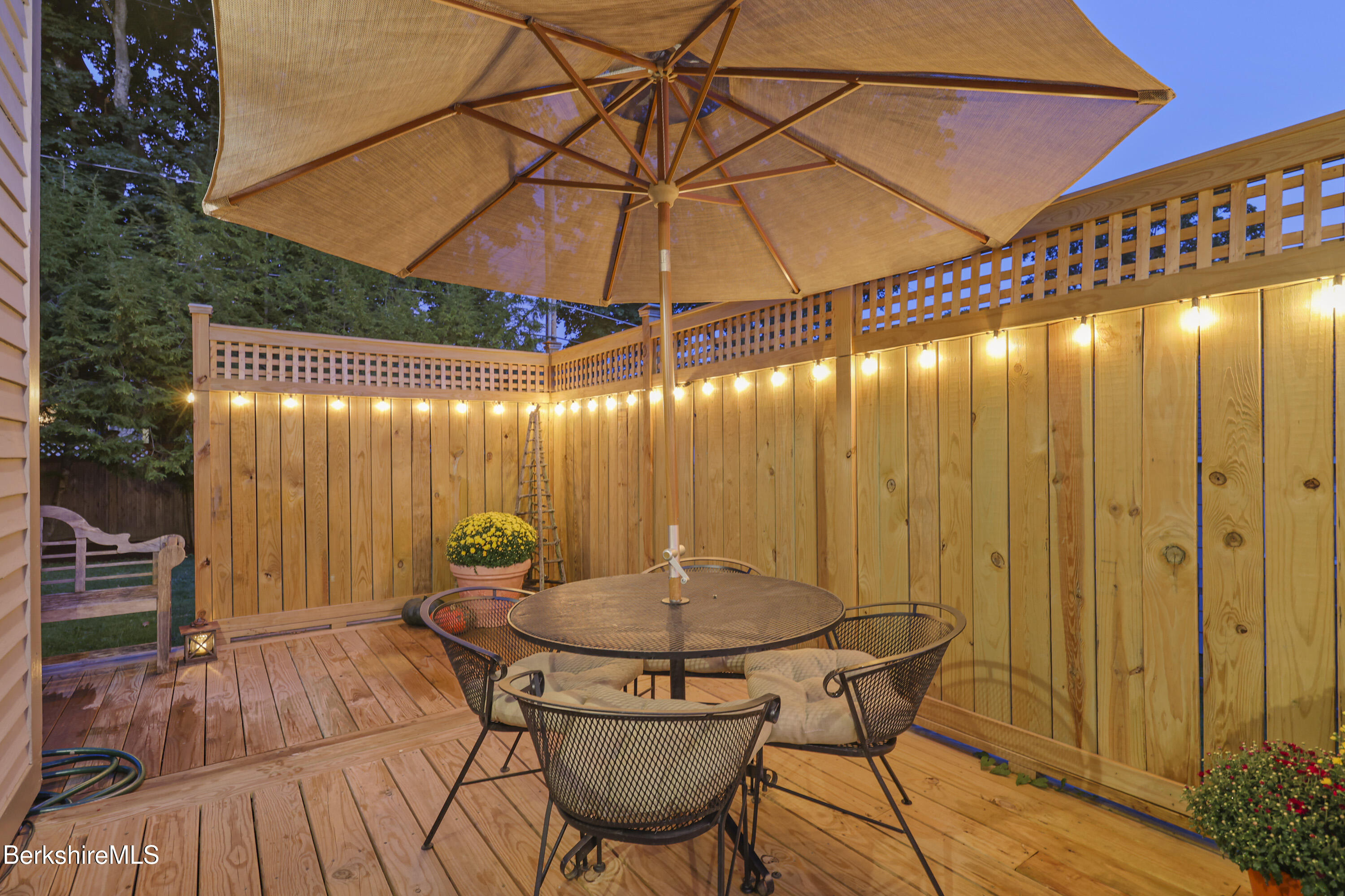 39 Lexington Parkway Pittsfield, MA 01201 - Photo 43 of 48 a patio with table and chairs