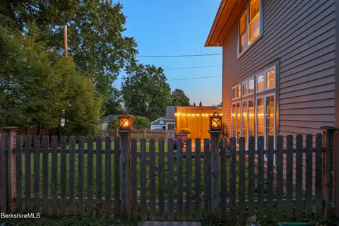 a view of street from balcony