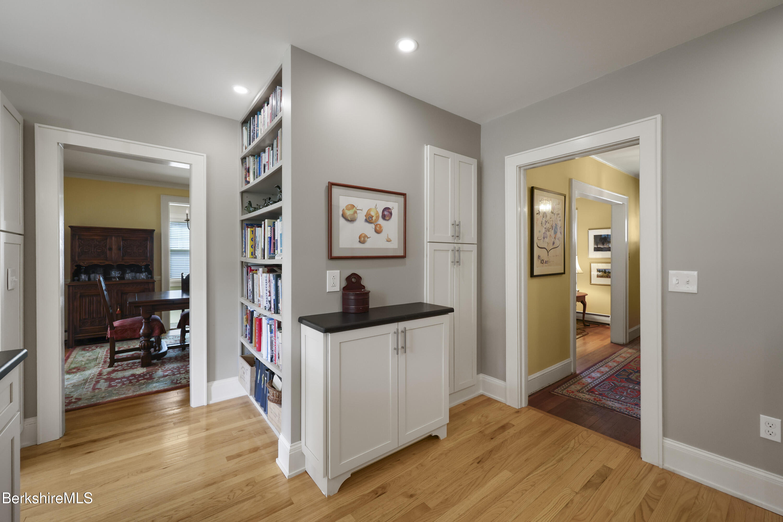 39 Lexington Parkway Pittsfield, MA 01201 - Photo 10 of 48 a view of a hallway with bathroom and wooden floor
