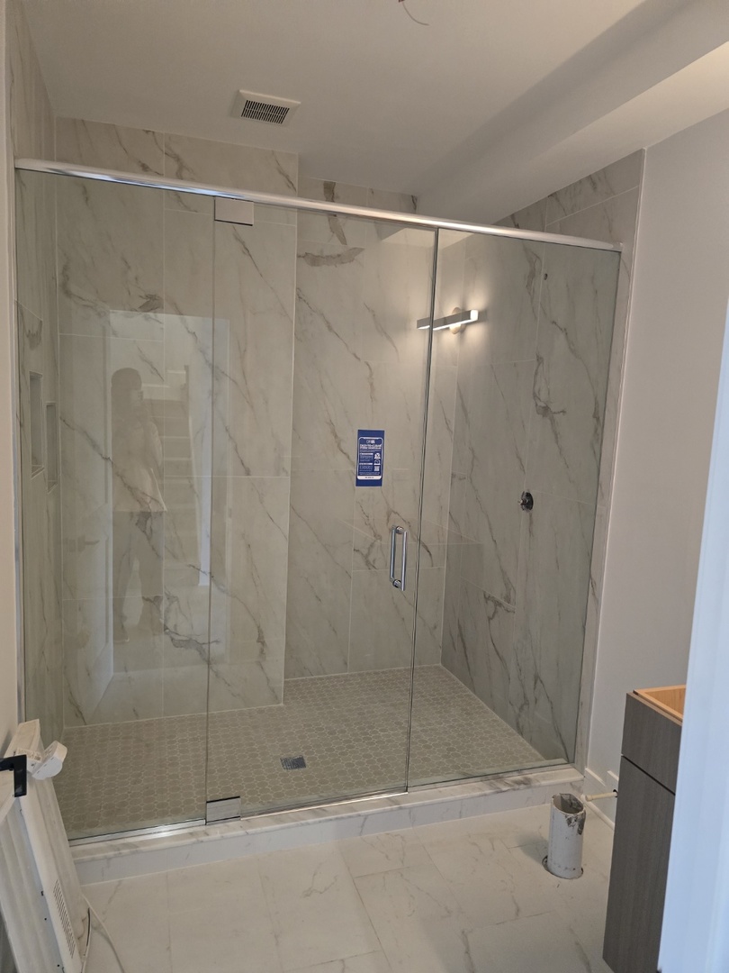 7234 Roxbury Court Long Grove, IL 60060 - Photo 23 of 34 a bathroom with a shower and toilet