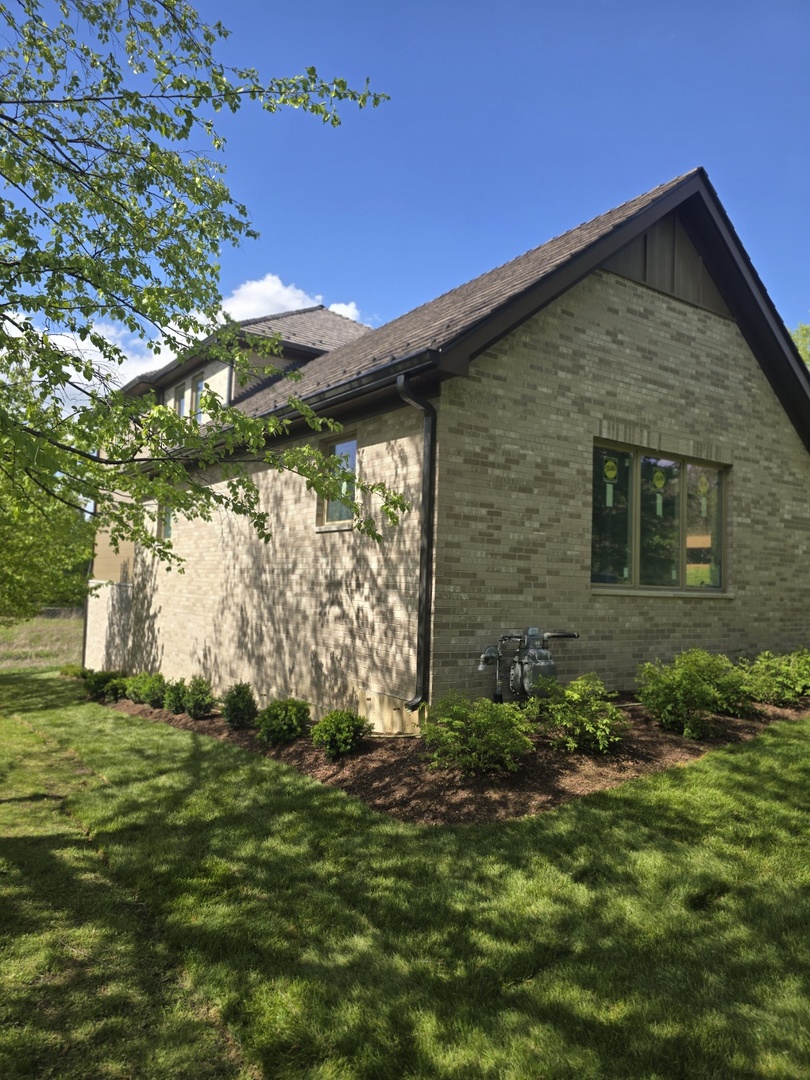 7234 Roxbury Court Long Grove, IL 60060 - Photo 26 of 34 a view of a house with a yard