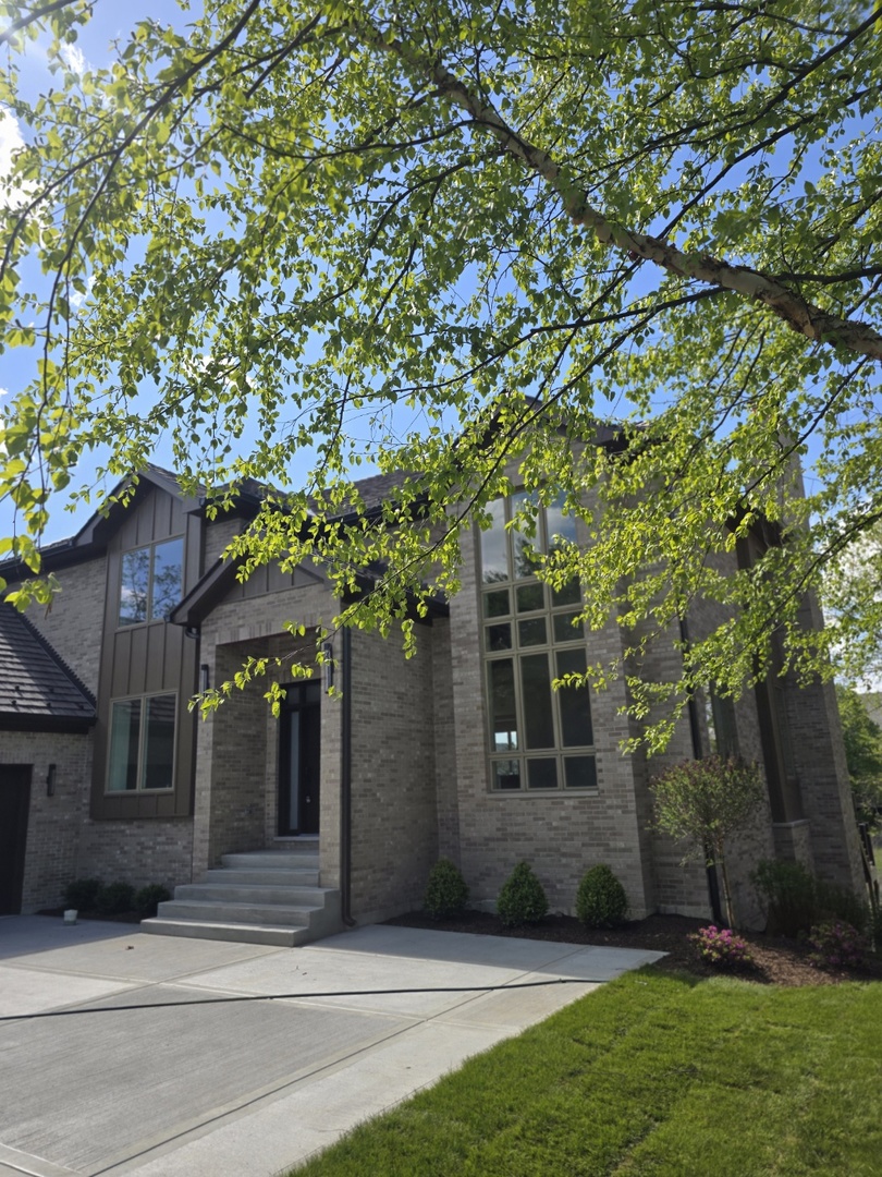 7234 Roxbury Court Long Grove, IL 60060 - Photo 7 of 34 front view of a house with a tree