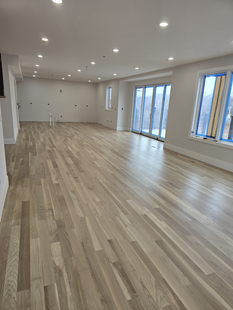 7234 Roxbury Court Long Grove, IL 60060 - Photo 8 of 17 a view of an empty room with windows