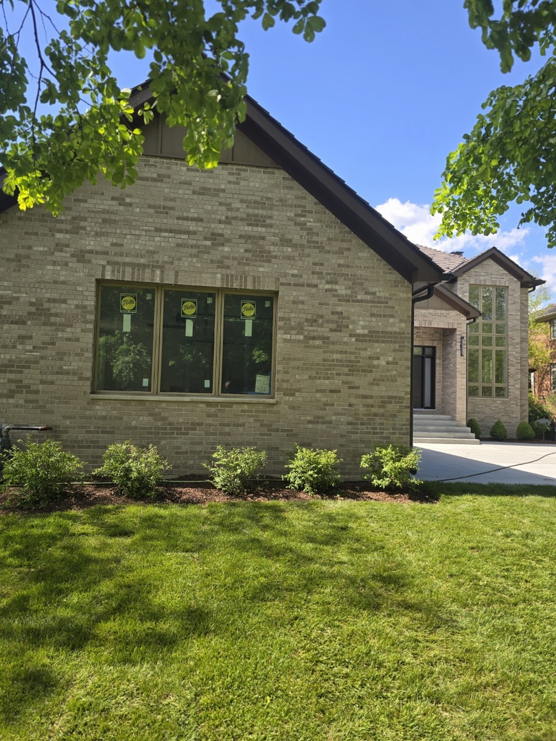7234 Roxbury Court Long Grove, IL 60060 - Photo 10 of 34 front view of a house with a yard