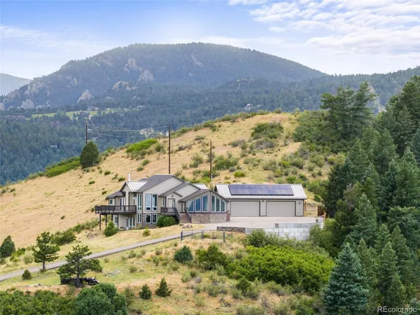 a view of a house with a mountain