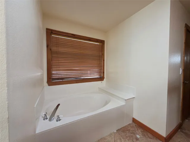 a bathroom with a bathtub
