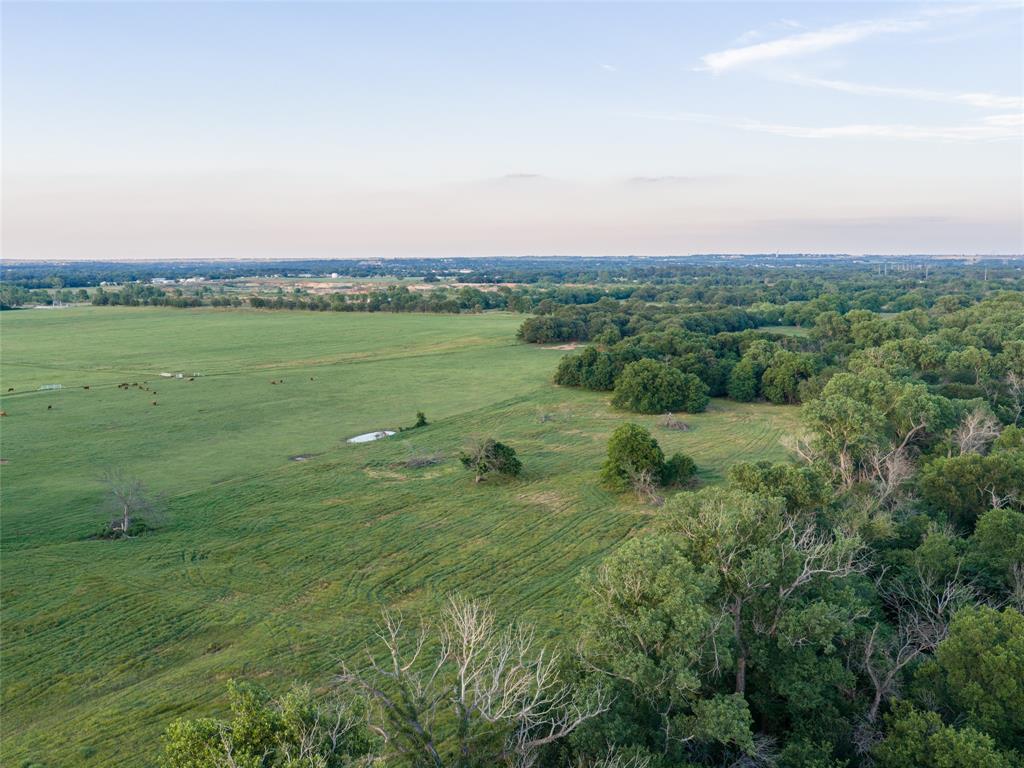 449 Private Road 4670 Rhome, TX 76078 - Photo 28 of 39 a view of a field with an ocean