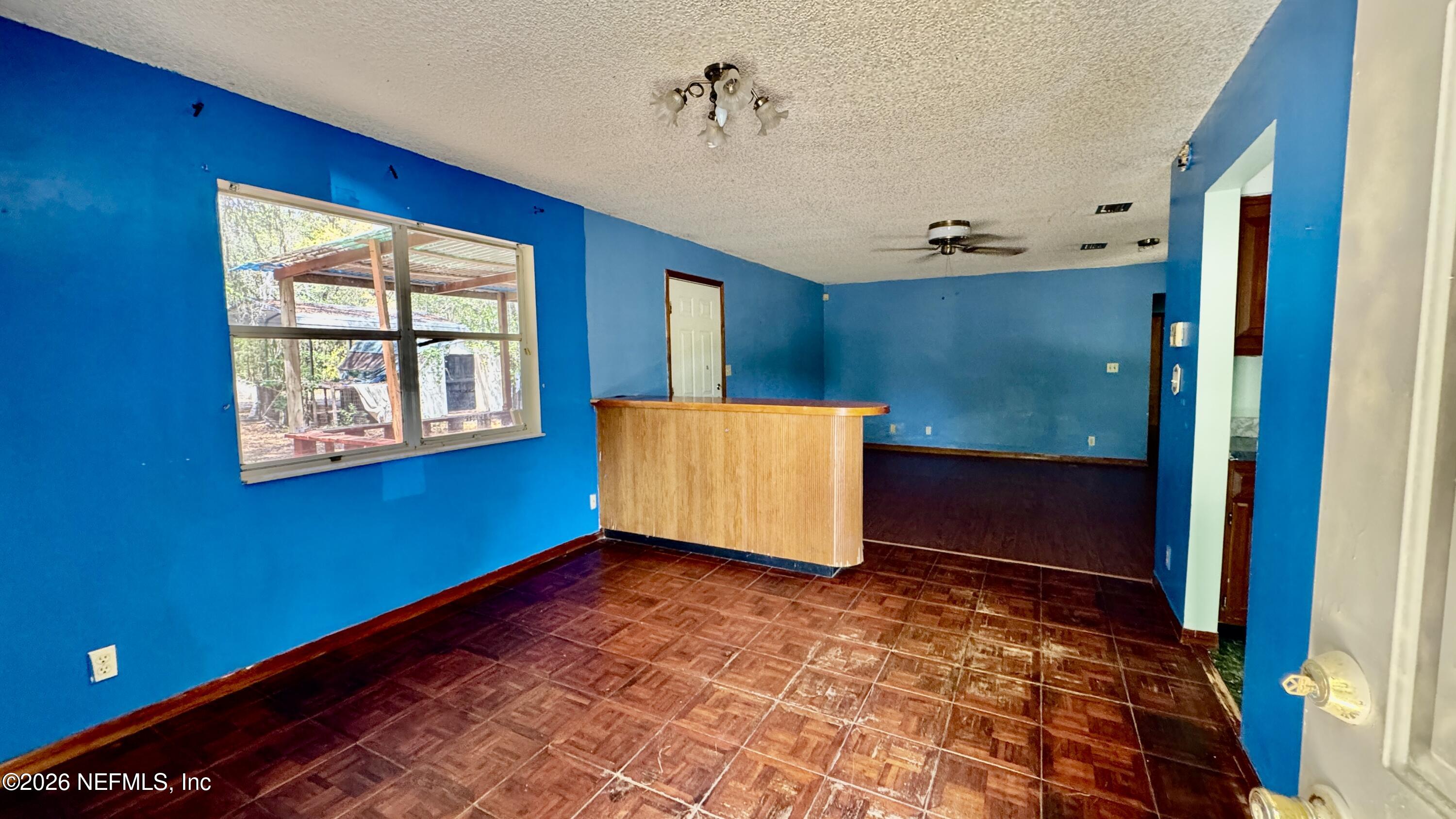 116 James Avenue Interlachen, FL 32148 - Photo 13 of 23 dining and living room