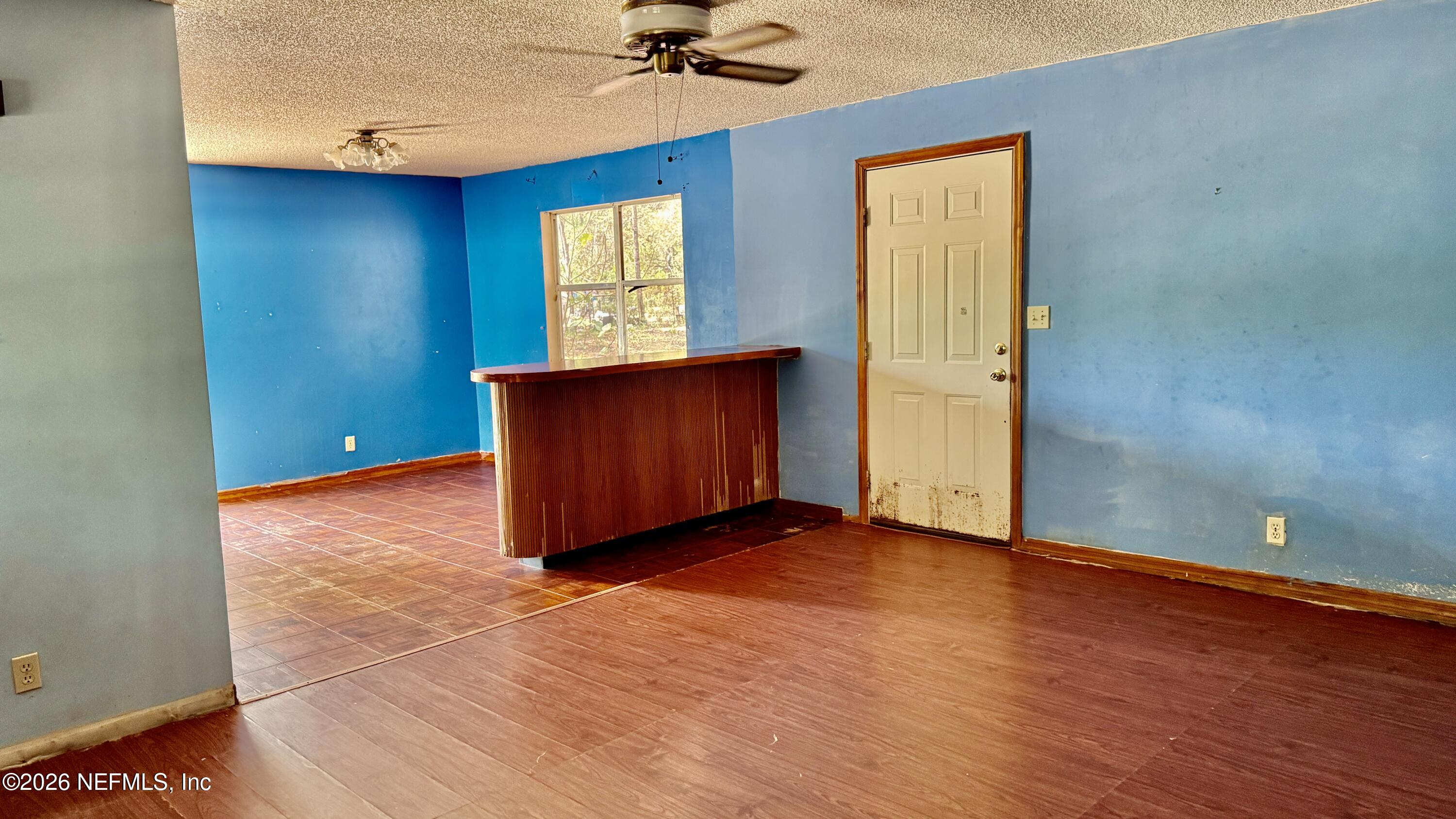 116 James Avenue Interlachen, FL 32148 - Photo 14 of 23 living room and dining